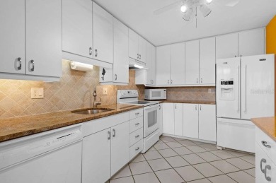 Discover the charm of the Huntingwood neighborhood, nestled in on The Meadows Golf and Country Club in Florida - for sale on GolfHomes.com, golf home, golf lot