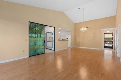 Discover the charm of the Huntingwood neighborhood, nestled in on The Meadows Golf and Country Club in Florida - for sale on GolfHomes.com, golf home, golf lot