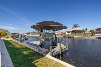 OWNER RELOCATED - ALL OFFERS CONSIDERED! This Gulf access pool on Burnt Store Golf Club in Florida - for sale on GolfHomes.com, golf home, golf lot