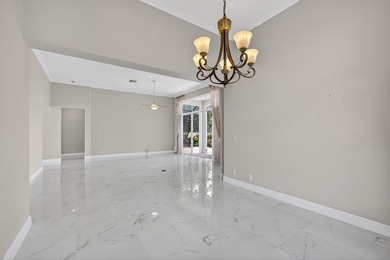 Welcome to your Lakefront Golf Course Retreat. Step into this on  in Florida - for sale on GolfHomes.com, golf home, golf lot