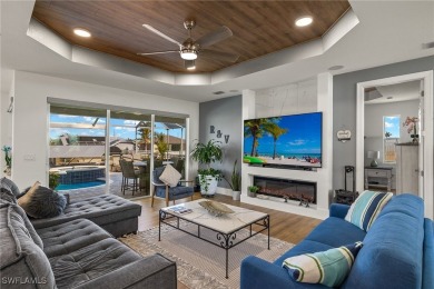 OWNER RELOCATED - ALL OFFERS CONSIDERED! This Gulf access pool on Burnt Store Golf Club in Florida - for sale on GolfHomes.com, golf home, golf lot
