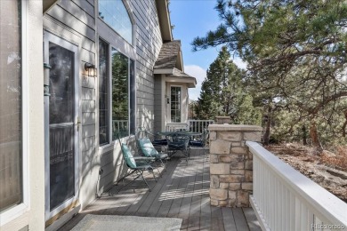 Exquisitely located on the edge of 11 acres of HOA owned forest on The Ridge At Castle Pines North in Colorado - for sale on GolfHomes.com, golf home, golf lot