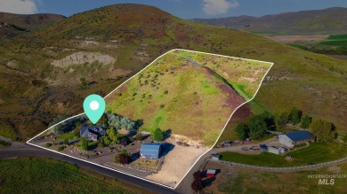 Discover a hidden retreat on 5 breathtaking acres in Weiser on Rolling Hills Golf Course in Idaho - for sale on GolfHomes.com, golf home, golf lot
