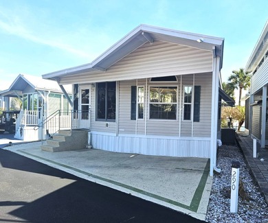 Welcome to 290 Doubles Lane, located in the 55+ Coop Regal Ridge on Deer Creek RV Golf Resort in Florida - for sale on GolfHomes.com, golf home, golf lot