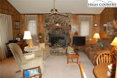 Nestled in the rhododendrons, you'll find this 2bdr/2bath on Land Harbor Golf Course in North Carolina - for sale on GolfHomes.com, golf home, golf lot