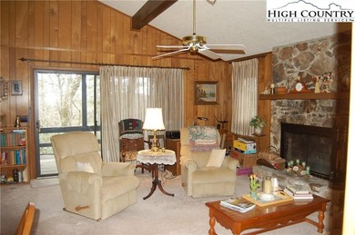 Nestled in the rhododendrons, you'll find this 2bdr/2bath on Land Harbor Golf Course in North Carolina - for sale on GolfHomes.com, golf home, golf lot