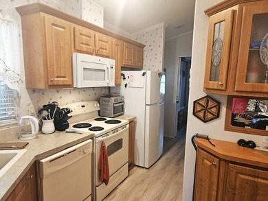 Welcome to 290 Doubles Lane, located in the 55+ Coop Regal Ridge on Deer Creek RV Golf Resort in Florida - for sale on GolfHomes.com, golf home, golf lot