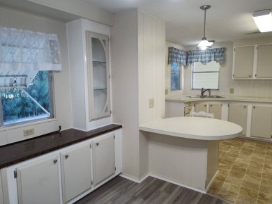 CHARMING COTTAGE HOME WITH PRIVATE BACK YARD! NEW VINYL PLANK on Vista Plantation Golf Club in Florida - for sale on GolfHomes.com, golf home, golf lot