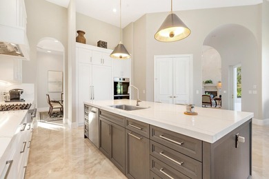 Welcome to this magnificent Villa Rosa Gem located on the 17th on Frenchmans Reserve in Florida - for sale on GolfHomes.com, golf home, golf lot