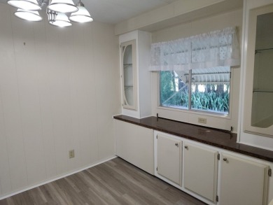 CHARMING COTTAGE HOME WITH PRIVATE BACK YARD! NEW VINYL PLANK on Vista Plantation Golf Club in Florida - for sale on GolfHomes.com, golf home, golf lot