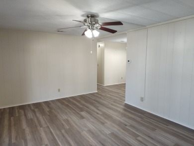 CHARMING COTTAGE HOME WITH PRIVATE BACK YARD! NEW VINYL PLANK on Vista Plantation Golf Club in Florida - for sale on GolfHomes.com, golf home, golf lot