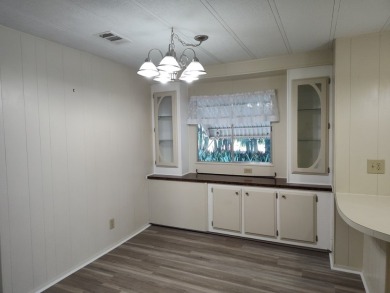 CHARMING COTTAGE HOME WITH PRIVATE BACK YARD! NEW VINYL PLANK on Vista Plantation Golf Club in Florida - for sale on GolfHomes.com, golf home, golf lot