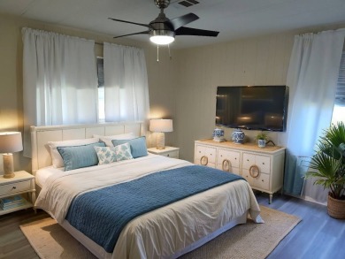 CHARMING COTTAGE HOME WITH PRIVATE BACK YARD! NEW VINYL PLANK on Vista Plantation Golf Club in Florida - for sale on GolfHomes.com, golf home, golf lot