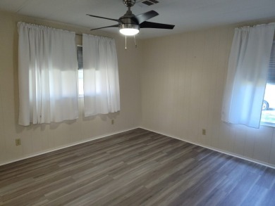 CHARMING COTTAGE HOME WITH PRIVATE BACK YARD! NEW VINYL PLANK on Vista Plantation Golf Club in Florida - for sale on GolfHomes.com, golf home, golf lot