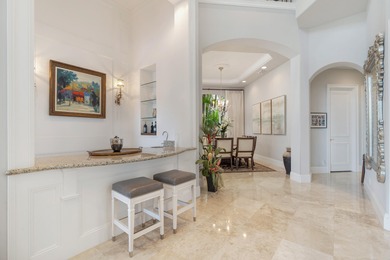 Welcome to this magnificent Villa Rosa Gem located on the 17th on Trump National Golf Club Jupiter in Florida - for sale on GolfHomes.com, golf home, golf lot