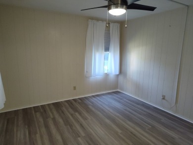 CHARMING COTTAGE HOME WITH PRIVATE BACK YARD! NEW VINYL PLANK on Vista Plantation Golf Club in Florida - for sale on GolfHomes.com, golf home, golf lot