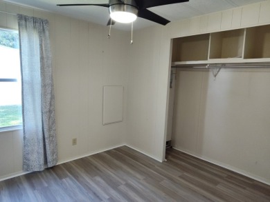 CHARMING COTTAGE HOME WITH PRIVATE BACK YARD! NEW VINYL PLANK on Vista Plantation Golf Club in Florida - for sale on GolfHomes.com, golf home, golf lot