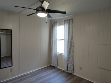 CHARMING COTTAGE HOME WITH PRIVATE BACK YARD! NEW VINYL PLANK on Vista Plantation Golf Club in Florida - for sale on GolfHomes.com, golf home, golf lot
