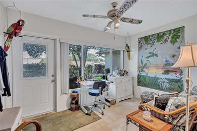 This end unit villa is right next to the covered carport and on Highland Lakes Executive Golf Course in Florida - for sale on GolfHomes.com, golf home, golf lot