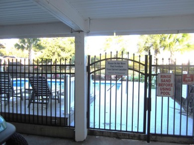 This is a condo that you don't want to miss in the popular on Surf Golf and Beach Club in South Carolina - for sale on GolfHomes.com, golf home, golf lot