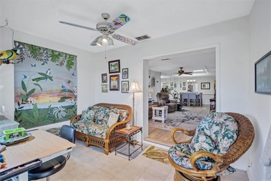 This end unit villa is right next to the covered carport and on Highland Lakes Executive Golf Course in Florida - for sale on GolfHomes.com, golf home, golf lot