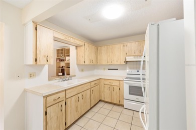 Is this the villa you have been waiting for? This is an end unit on On Top of the World Golf Course in Florida - for sale on GolfHomes.com, golf home, golf lot