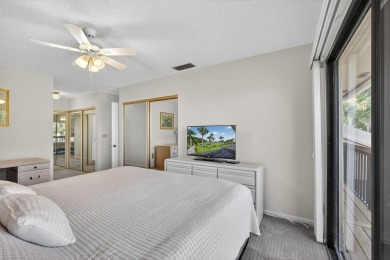 This property is located in the highly sought after private on PGA National Golf Club in Florida - for sale on GolfHomes.com, golf home, golf lot
