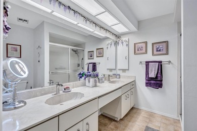 This end unit villa is right next to the covered carport and on Highland Lakes Executive Golf Course in Florida - for sale on GolfHomes.com, golf home, golf lot