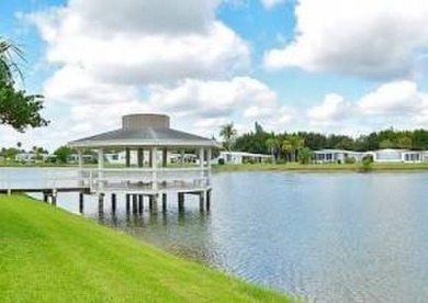 CHARMING COTTAGE HOME WITH PRIVATE BACK YARD! NEW VINYL PLANK on Vista Plantation Golf Club in Florida - for sale on GolfHomes.com, golf home, golf lot