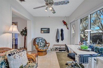 This end unit villa is right next to the covered carport and on Highland Lakes Executive Golf Course in Florida - for sale on GolfHomes.com, golf home, golf lot