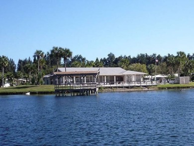 CHARMING COTTAGE HOME WITH PRIVATE BACK YARD! NEW VINYL PLANK on Vista Plantation Golf Club in Florida - for sale on GolfHomes.com, golf home, golf lot