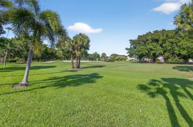This property is located in the highly sought after private on PGA National Golf Club in Florida - for sale on GolfHomes.com, golf home, golf lot