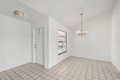 Welcome to this stunning 2-bedroom, 2-bath waterfront home on Caloosa Greens Executive Golf Course in Florida - for sale on GolfHomes.com, golf home, golf lot