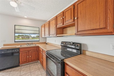 Welcome to this stunning 2-bedroom, 2-bath waterfront home on Caloosa Greens Executive Golf Course in Florida - for sale on GolfHomes.com, golf home, golf lot