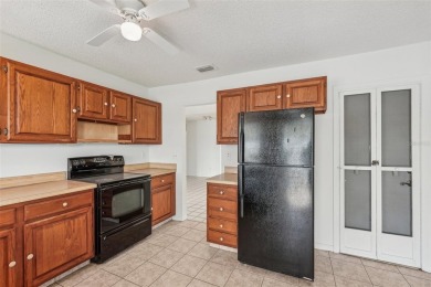 Welcome to this stunning 2-bedroom, 2-bath waterfront home on Caloosa Greens Executive Golf Course in Florida - for sale on GolfHomes.com, golf home, golf lot