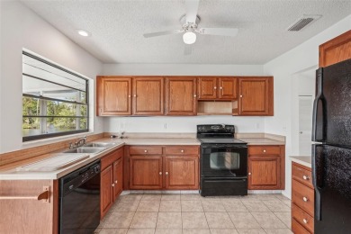 Welcome to this stunning 2-bedroom, 2-bath waterfront home on Caloosa Greens Executive Golf Course in Florida - for sale on GolfHomes.com, golf home, golf lot