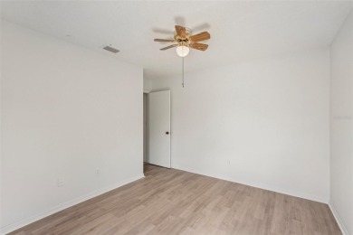 Welcome to this stunning 2-bedroom, 2-bath waterfront home on Caloosa Greens Executive Golf Course in Florida - for sale on GolfHomes.com, golf home, golf lot