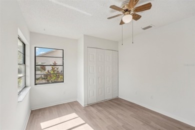 Welcome to this stunning 2-bedroom, 2-bath waterfront home on Caloosa Greens Executive Golf Course in Florida - for sale on GolfHomes.com, golf home, golf lot