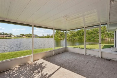 Welcome to this stunning 2-bedroom, 2-bath waterfront home on Caloosa Greens Executive Golf Course in Florida - for sale on GolfHomes.com, golf home, golf lot