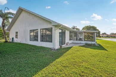 Welcome to this stunning 2-bedroom, 2-bath waterfront home on Caloosa Greens Executive Golf Course in Florida - for sale on GolfHomes.com, golf home, golf lot