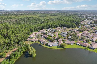 Welcome to this stunning 2-bedroom, 2-bath waterfront home on Caloosa Greens Executive Golf Course in Florida - for sale on GolfHomes.com, golf home, golf lot
