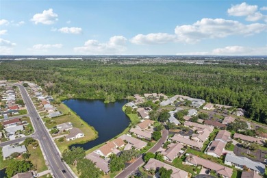 Welcome to this stunning 2-bedroom, 2-bath waterfront home on Caloosa Greens Executive Golf Course in Florida - for sale on GolfHomes.com, golf home, golf lot