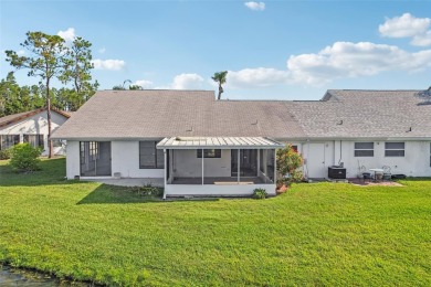 Welcome to this stunning 2-bedroom, 2-bath waterfront home on Caloosa Greens Executive Golf Course in Florida - for sale on GolfHomes.com, golf home, golf lot