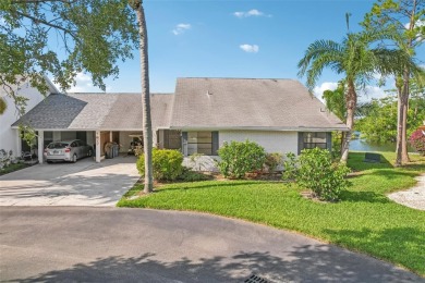 Welcome to this stunning 2-bedroom, 2-bath waterfront home on Caloosa Greens Executive Golf Course in Florida - for sale on GolfHomes.com, golf home, golf lot
