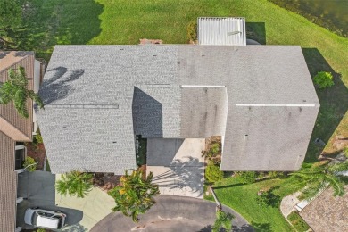 Welcome to this stunning 2-bedroom, 2-bath waterfront home on Caloosa Greens Executive Golf Course in Florida - for sale on GolfHomes.com, golf home, golf lot