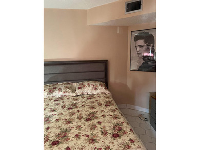 3755 Via Poinciana unit: 203 on Poinciana Golf Club in Florida - for sale on GolfHomes.com, golf home, golf lot