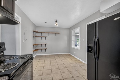 Refreshed and move-in ready, this three-bedroom, cottage-style on Osceola Municipal Golf Course in Florida - for sale on GolfHomes.com, golf home, golf lot