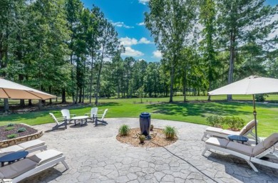 Welcome to your dream home, perfectly nestled on nearly an acre on The Patriot Golf Club At Grand Harbor in South Carolina - for sale on GolfHomes.com, golf home, golf lot