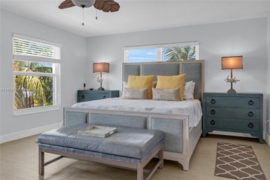 This Key Colony Beach coastal retreat blends modern elegance on Key Colony Beach Golf Course in Florida - for sale on GolfHomes.com, golf home, golf lot