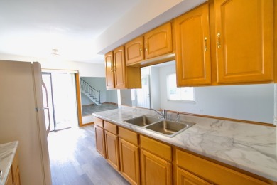 This is a 2 story end unit town home located in a quiet on Poplar Creek Country Club in Illinois - for sale on GolfHomes.com, golf home, golf lot